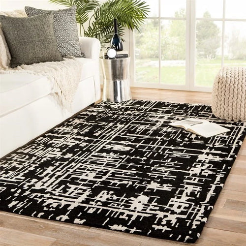 Clayt BlackCream Abstract Hand-Tufted Wool Rug - Image 1