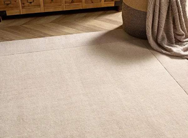 Natural Solid Hand-Tufted Wool Rug - Image 1